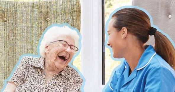 Elderly woman and young woman laughing and smiling at each other